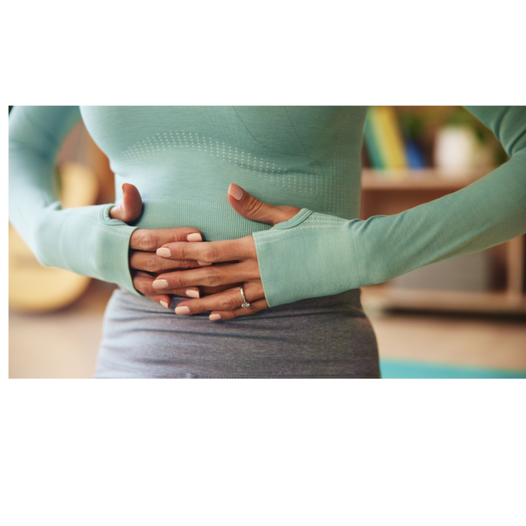 Person in a long-sleeve top holding their stomach, looking concerned.